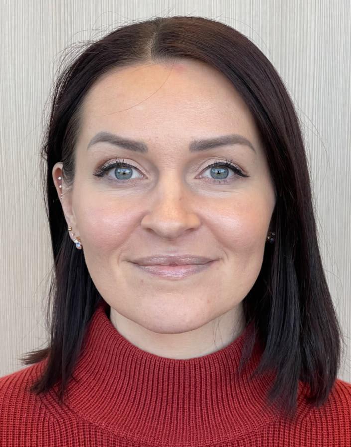 Front view of a woman in a red sweater after botox treatment