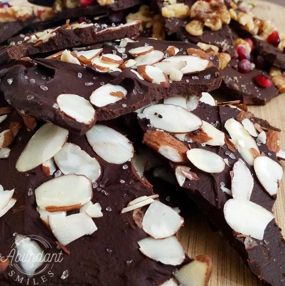 A close up of brownies with nuts